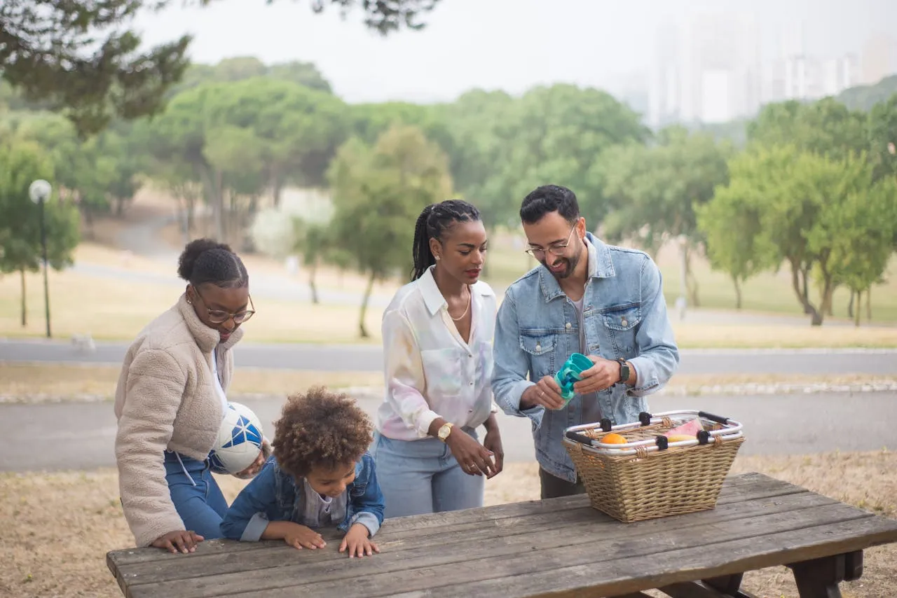 Multi-generational diverse community gathering in a park